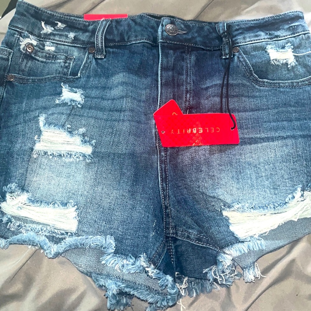 Celebrity pink distressed denim shorts